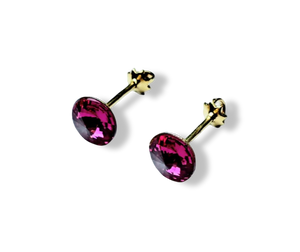 ARETE BROQUEL CRISTAL FUCSIA DORADO