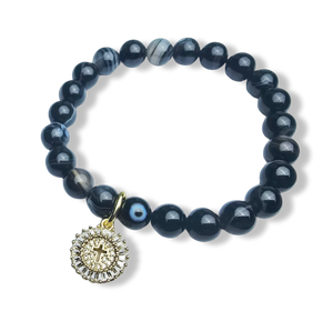 PULSERA CRUZ CIRCONIA Y ÁGATA NEGRA DORADO