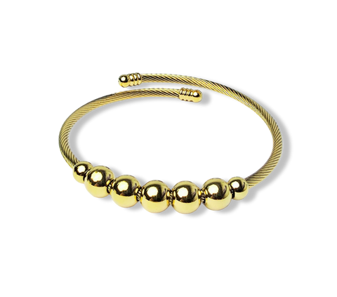PULSERA WATERPROOF Y ESFERAS DORADO