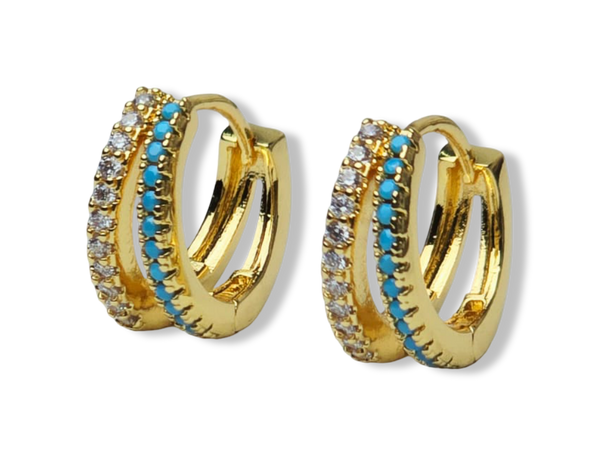 ARETE DOBLE CIRCONIAS BLANCO Y CELESTE DORADO